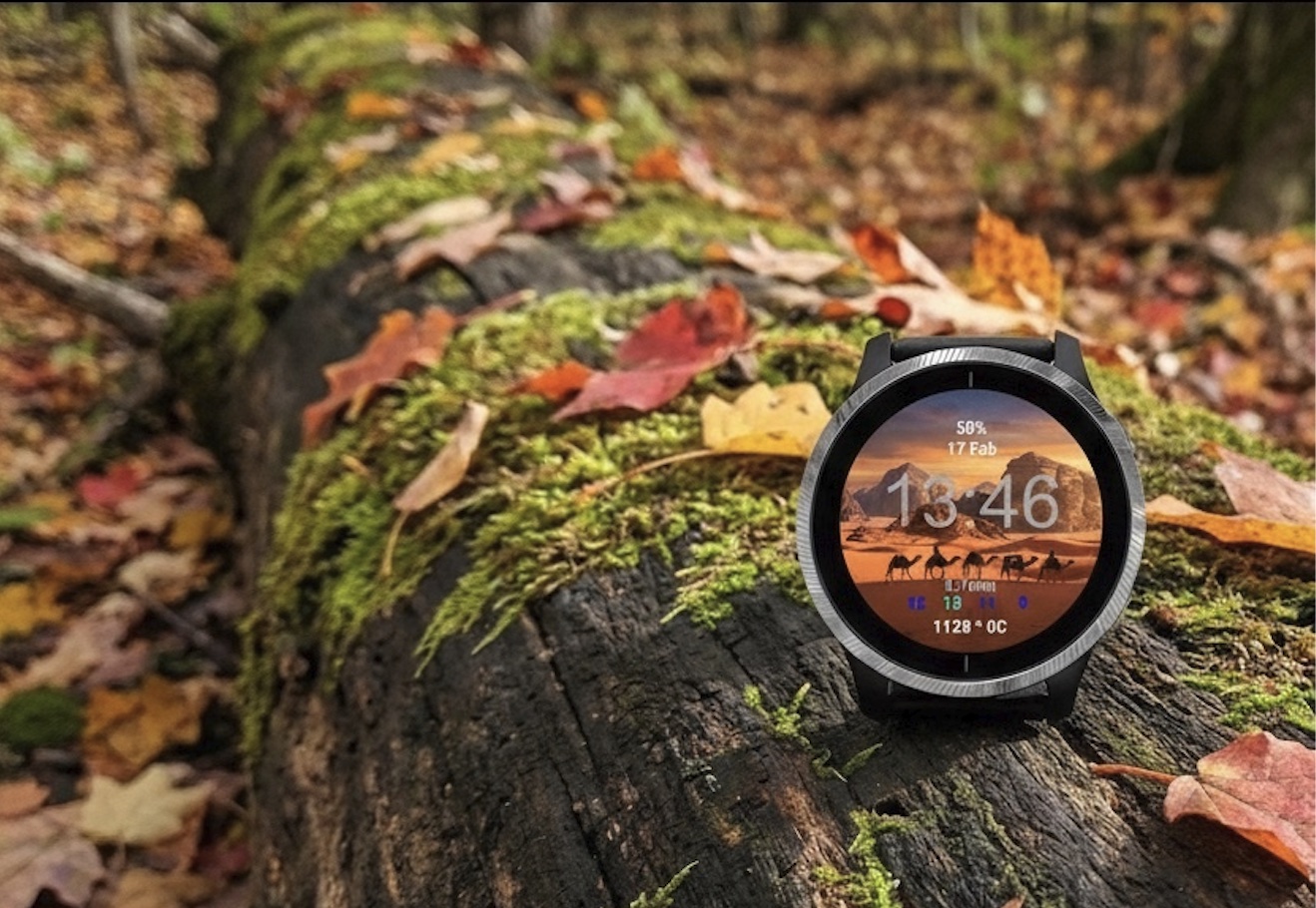 Garmin watch on a fallen tree in a forest